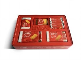 Food-grade red tin box with clear PET plastic trays for biscuits, made by a tin box manufacturer.