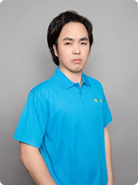 Portrait of Mike, the Design Director, wearing a blue polo shirt and looking directly at the camera.