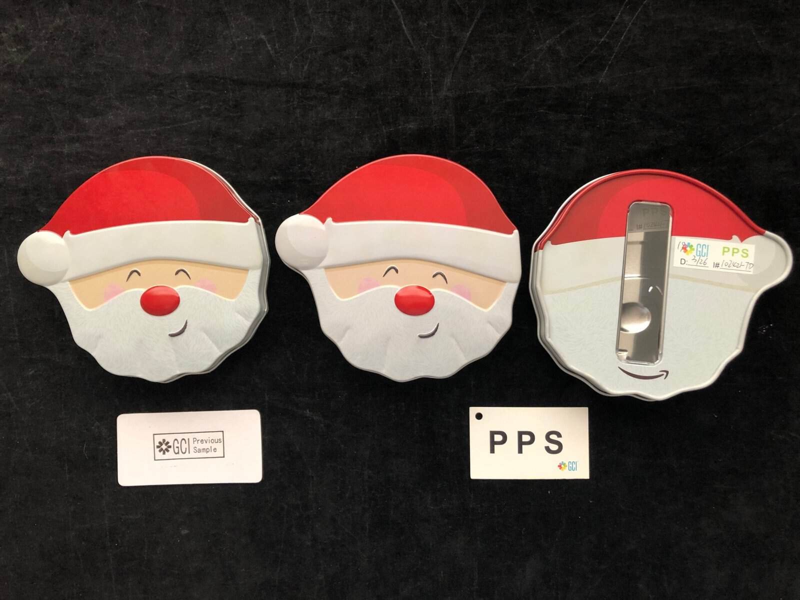 Santa gift tin PPS comparison before bulk tins production