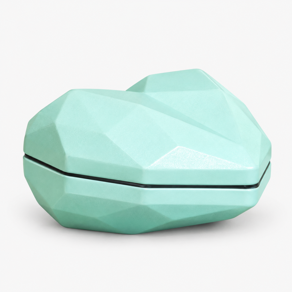 Mint-green tin with a faceted geometric shape